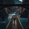 A person crossing a bridge over a gorge in a national park