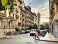 Person on crossing on classic geneva street