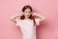 Enjoy children sound headphones cute music listen girl little childhood entertainment Royalty Free Stock Photo