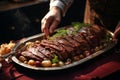 Person cutting a large roast beef