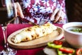 Person Cutting a Slice of Food on a Plate Royalty Free Stock Photo