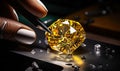 A Person Cutting a Yellow Diamond with Scissors