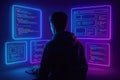 Person in hoodie coding on multiple glowing blue and pink digital screens programmer computer Royalty Free Stock Photo