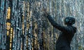 Futuristic Figure Interacting with Digital Matrix Royalty Free Stock Photo