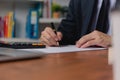 person document writing on paper with a pen, Man worker signing job contract, note, insurance and report concept Royalty Free Stock Photo