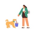 Person and dog get ready to go for walk and rest in nature. Woman and doggy preparing for strolling and relaxing