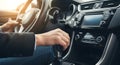 Person Driving a Car with Gear Shift and Dashboard Controls Royalty Free Stock Photo