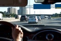 Person Driving Car on Highway