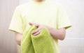 a person drying hands with towel in bathroom, washing dirty hands Royalty Free Stock Photo