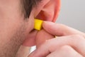 Person Ear With Earplug Royalty Free Stock Photo