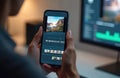 Person edits videos using smartphone app. Mobile phone displays video editing timeline, interface. Video creation process, post- Royalty Free Stock Photo