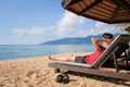 Relaxing image of tourist at holiday beach