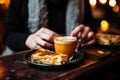 person enjoying a grilled cheese sandwich with soup