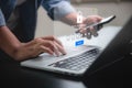 person entering OTP code on laptop for secure two factor authentication login. ensuring secure online authentication. data