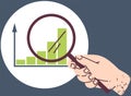 Person examines diagram under magnifier. Hand with loupe magnifying statistical pie chart