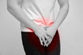 Person experiencing pain from prostate gland and urination