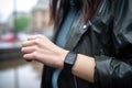 person, feeding data from wearable device into weather app, to predict rain or shine for the day