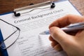 Person Filling Criminal Background Check Application Form Royalty Free Stock Photo