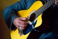 Person finger picking guitar Royalty Free Stock Photo