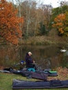 Person Fishing by a Lake