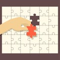 Person fitting the last puzzle piece Royalty Free Stock Photo