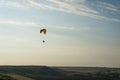 person flying on paraplane sky with clouds on background Ukraine Crimea Royalty Free Stock Photo