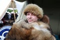 Person in fur hat and cape Royalty Free Stock Photo