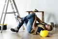 A person getting injured falling from a ladder Royalty Free Stock Photo