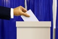 Person hand casting a vote Royalty Free Stock Photo
