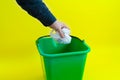 a person hand drop trash in the garbage bin Royalty Free Stock Photo
