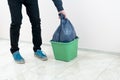 a person hand drop trash in the garbage bin Royalty Free Stock Photo