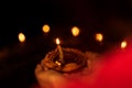 Person Hand Holding Diya on Diwali