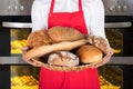 Person Hand Holding Plate Full Of Breads And Buns Royalty Free Stock Photo