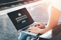 Person hand typing on keyboard with login and password on screen display, cyber security concept Royalty Free Stock Photo