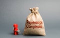 A person is handcuffed with a bag labeled psychological complexes. Feeling of inferiority and low self-esteem, low social skills Royalty Free Stock Photo