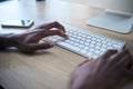 Person hands, keyboard and typing on computer with email, working and digital research. Worker, seo job and planning