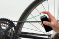 Person Hands Lubricating Bike Royalty Free Stock Photo