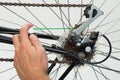 Person Hands Lubricating Bike