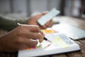 Person Hands With Mobile Phone And Diary Royalty Free Stock Photo