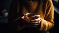 A person holding a cup of tea focusing on each sip mindfully created with Generative AI Royalty Free Stock Photo