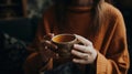 A person holding a cup of tea focusing on each sip mindfully created with Generative AI Royalty Free Stock Photo