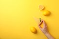 Person hold slice of lemon tart on background, top view Royalty Free Stock Photo