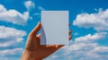 A person holding a blank white card in their hand, AI Royalty Free Stock Photo