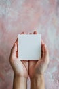 A person holding a blank white piece of paper in their hands, AI Royalty Free Stock Photo