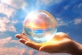 A person holding a crystal ball in their hand. Generative AI image. Royalty Free Stock Photo