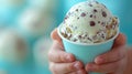 A person holding a cup of ice cream with chocolate chips, AI Royalty Free Stock Photo