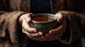 A person holding a cup of tea focusing on each sip mindfully created with Generative AI Royalty Free Stock Photo