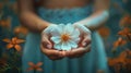Person Holding Flower in Hands Royalty Free Stock Photo