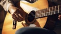 Person Holding Guitar in Hands, Musician Playing Stringed Instrument, Close-Up Shot Royalty Free Stock Photo