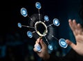 Person Holding Magnifying Glass with Digital Icons Representing Technology, Innovation, and Data Analysis, Concept of Royalty Free Stock Photo
